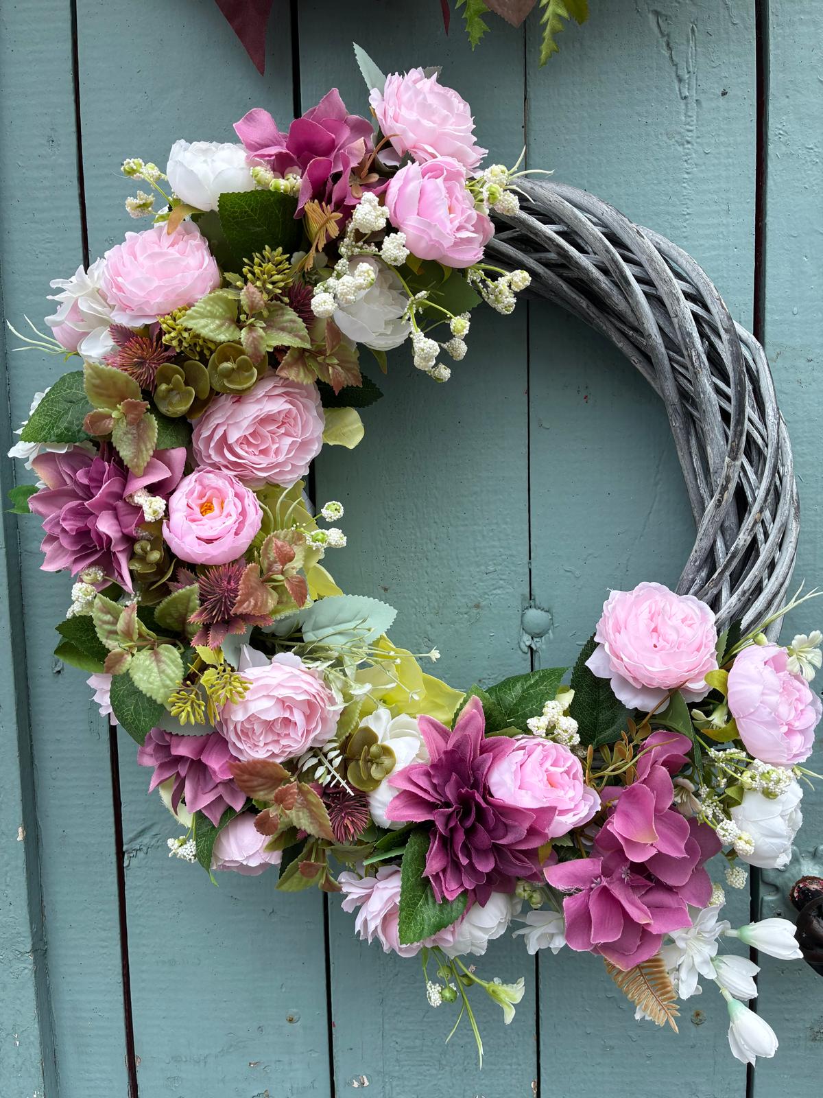 Summer Blush wreath with pink roses and mauve dahlias on a grey willow ring