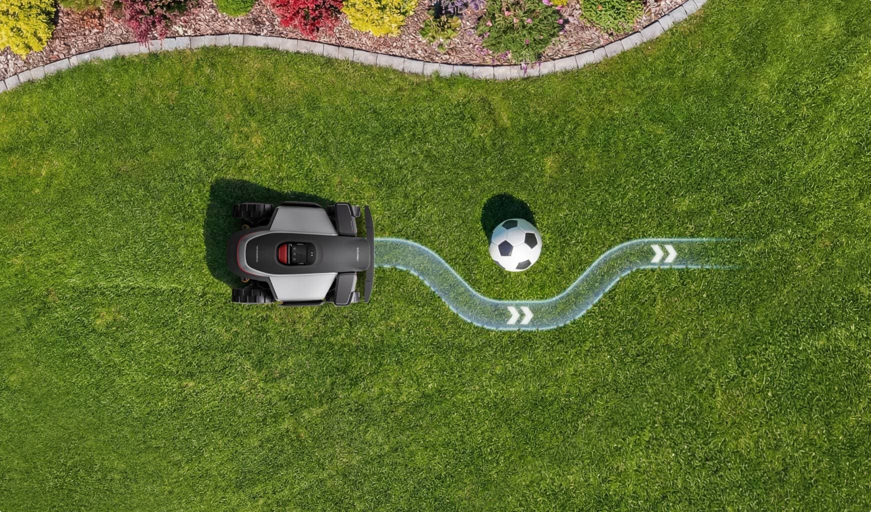 RockMow Z120 navigating the garden