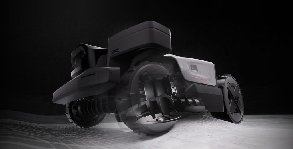 RockMow Z115 crossing rough ground on its suspension